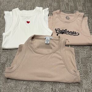 Assortment XS women’s tanks, social culture, a new day, and better together